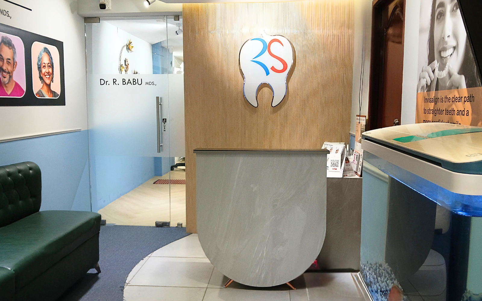 Reception desk with the R S Dental Care tooth logo